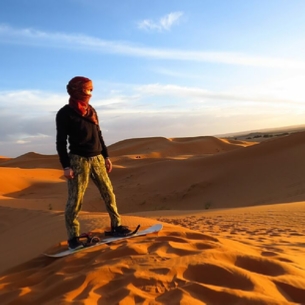 Sandboarding in Merzouga dunes - Erg Chebbi desert activities